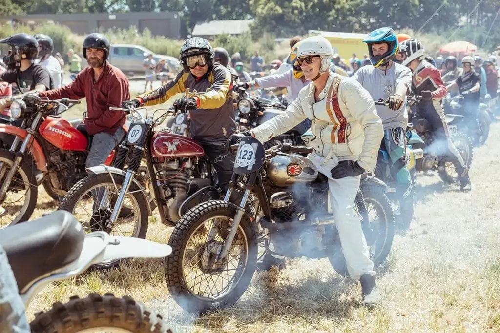 A group of motorcyclists in vintage style clothing