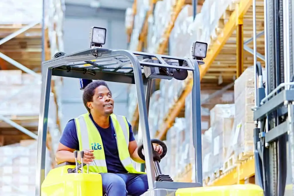 ILG warehouse employee operating a forklift